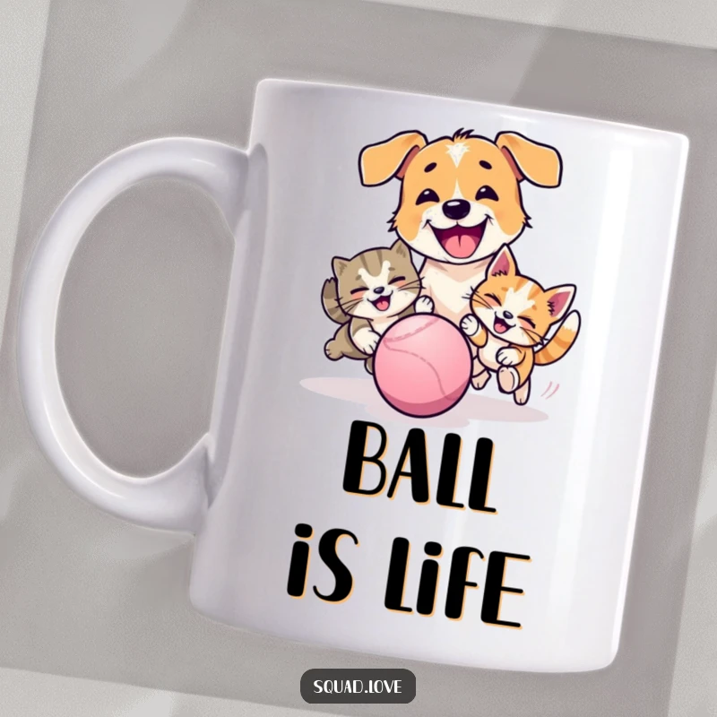 Funny mug featuring a happy dog and cat playfully chasing a brightly bouncing ball, capturing energetic pet fun.