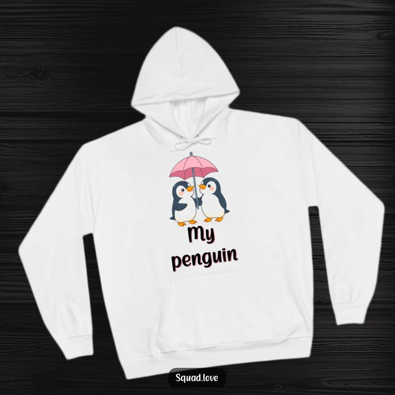 Funny penguin umbrella hoodie, showing two playful penguins giggling and sharing an umbrella, perfect for cozy, rainy day vibes.