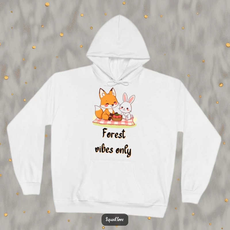 Funny hoodie depicting a smiling fox and a friendly rabbit sharing a picnic, exuding peace and charming camaraderie.