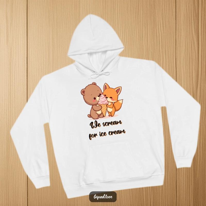 Funny hoodie depicting a bear cub and fox happily sharing a huge ice cream cone, symbolizing sweet friendship and cozy vibes.