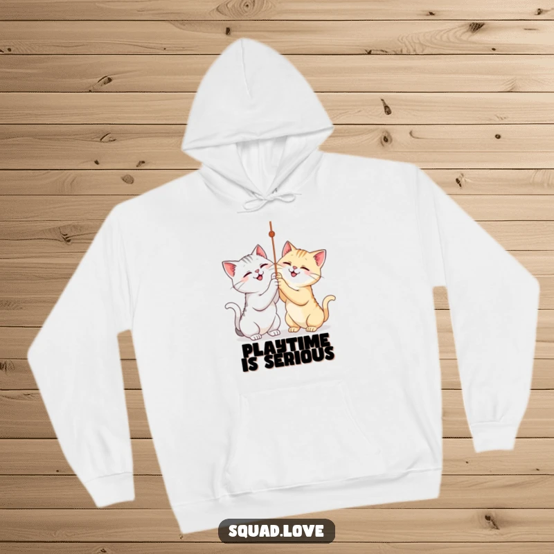Funny hoodie with two smiling cats playfully engaged with a dangling string, offering warmth and humor. Perfect gift.