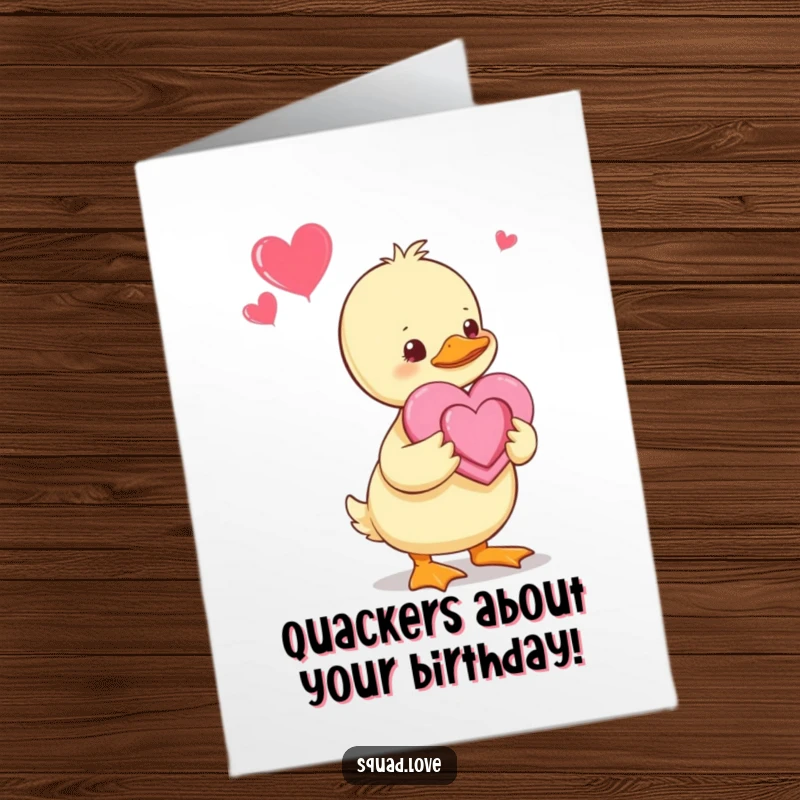 Funny Free Printable Birthday Card: A baby duckling lovingly offers a handmade heart, symbolizing pure joy and sweetness.