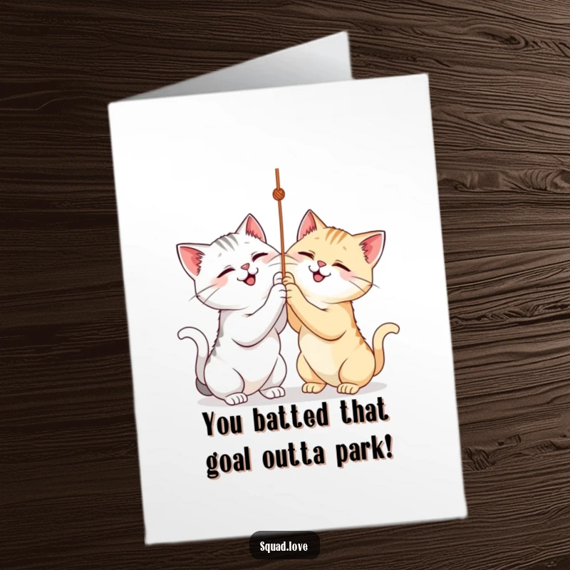 Funny Free Printable Congratulations Card featuring two happy cats entangled in a string, celebrating a success with playful abandon.